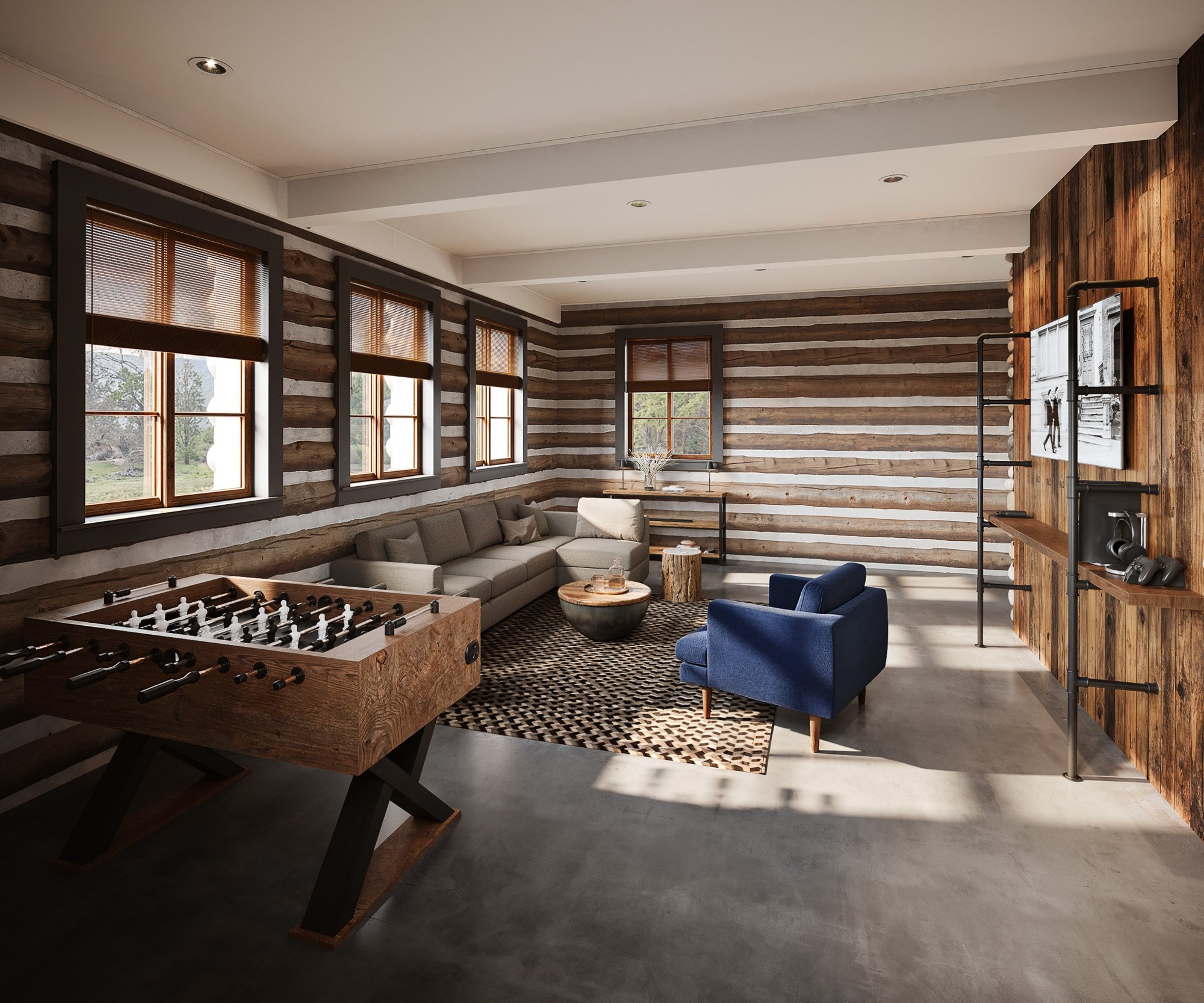 Modern timber VIP lounge at Casa del Rio featuring log walls, foosball table, sectional sofa, blue accent chair, and wooden shelving in a comfortable pre-wedding gathering space.