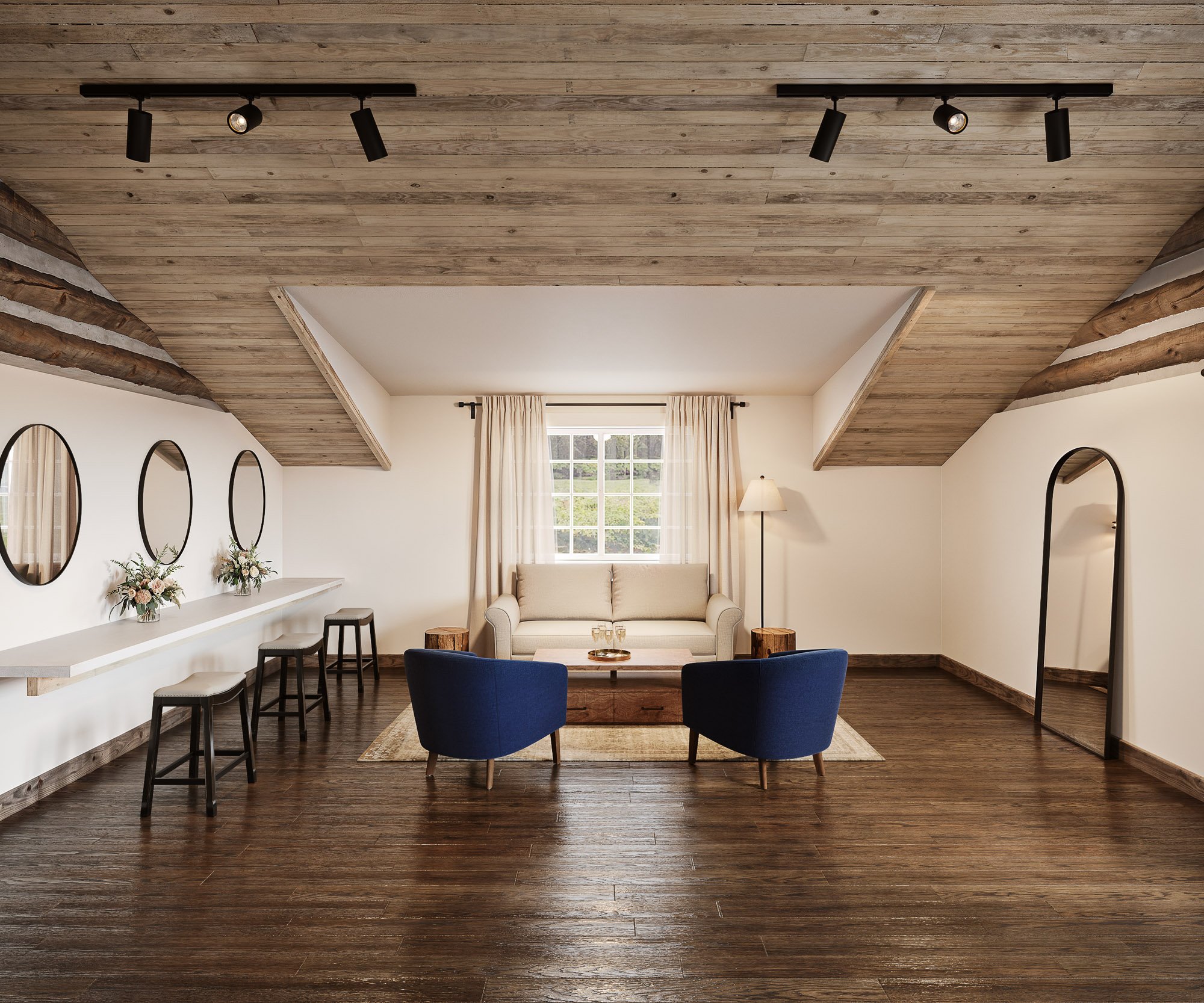Spacious dressing room featuring wooden ceiling beams, vanity area with oval mirrors, comfortable seating area with blue accent chairs, and natural lighting.