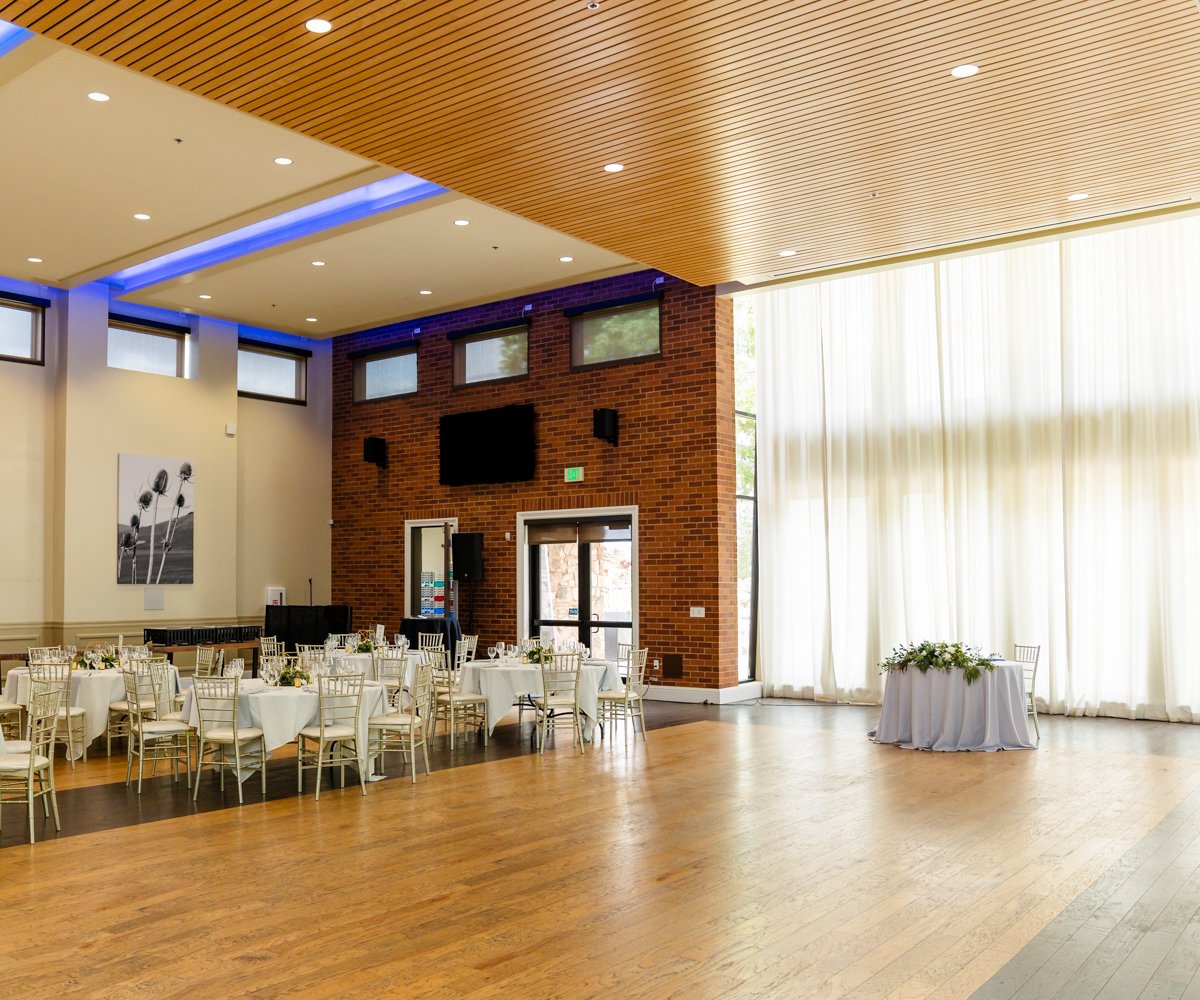 Grand hall reception with hardwood floors and elevated ceilings - Evergreen Springs by Wedgewood Weddings - 17