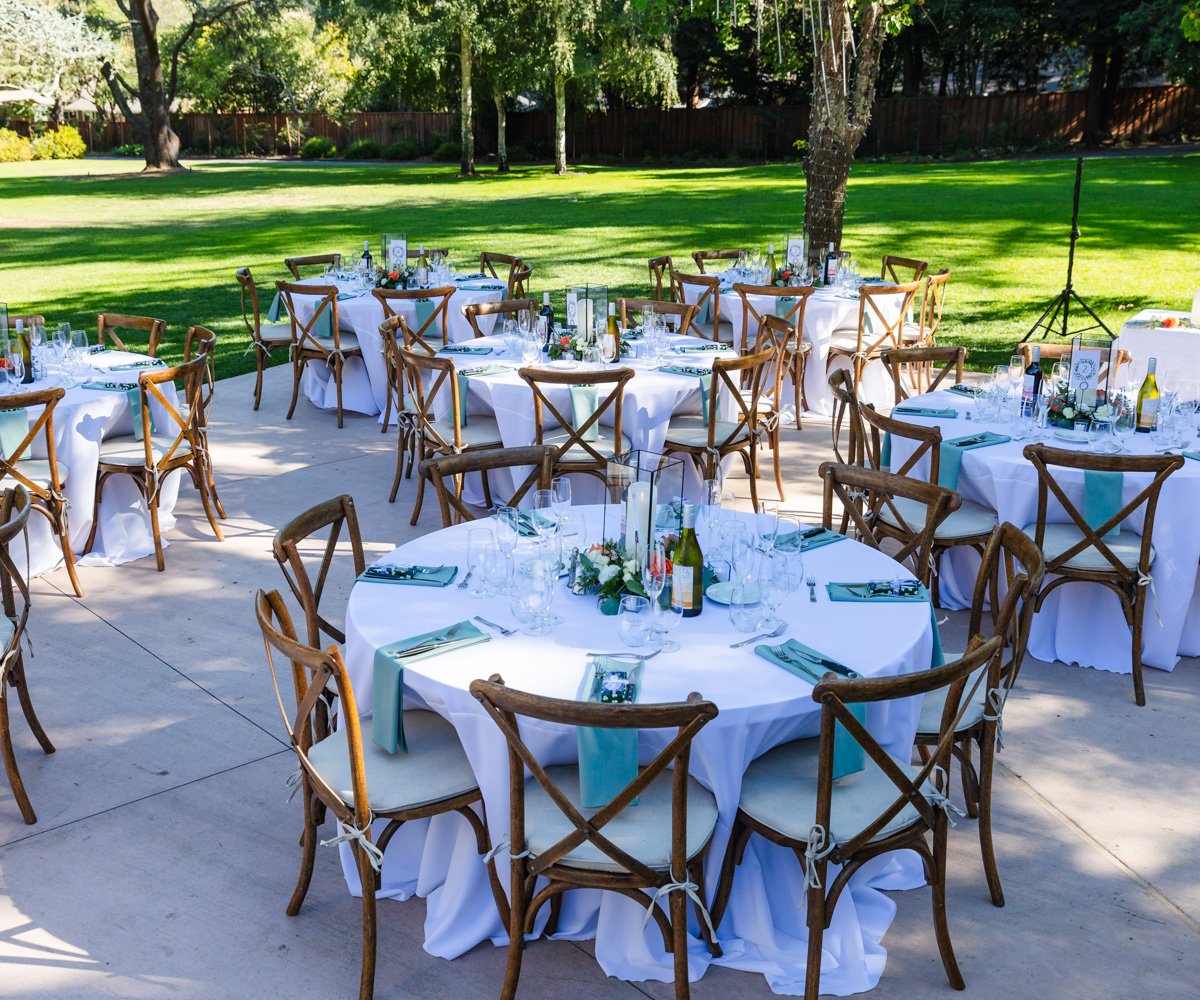 Alfresco wedding reception with cross back chairs, mint green napkins, and white table cloths - Moraga, CA - Hacienda de las Flores by Wedgewood Weddings - 5
