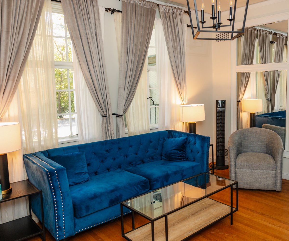 Get ready suite with blue velvet couch and grey chair - Moraga, CA - Hacienda de las Flores by Wedgewood Weddings - 1