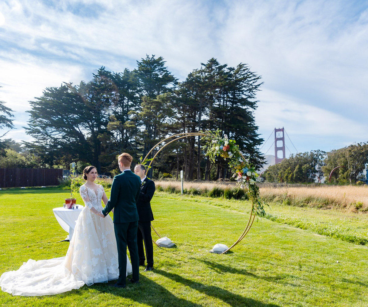 Couple says I do in front of the Golden Gate Bridge -  - 1