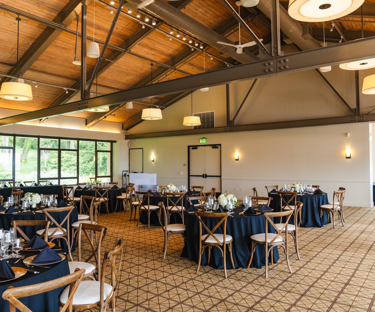 Wedding reception decorated with white flowers and dark blue tables - Officers Club at the Presidio - Wedgewood Weddings - 1