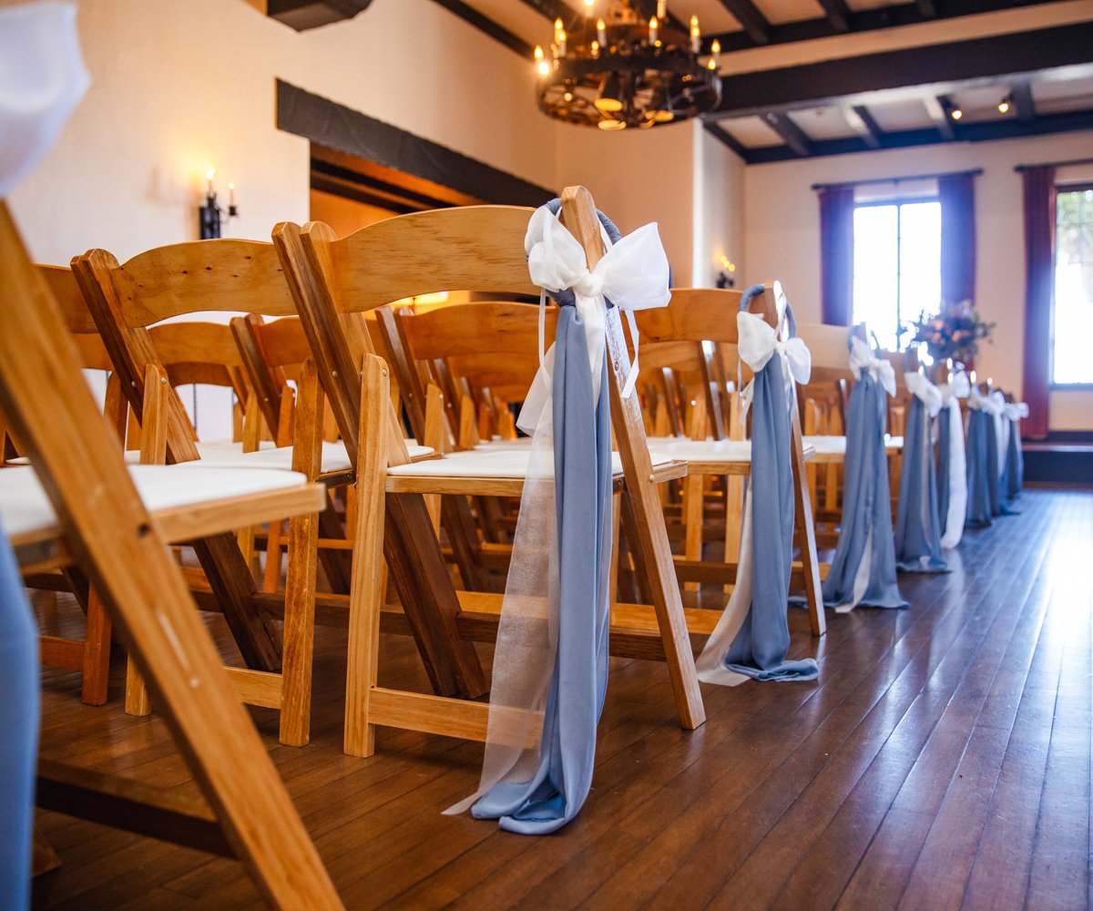 White and blue bows added to aisle as decorations - Officers Club at the Presidio - Wedgewood Weddings - 3