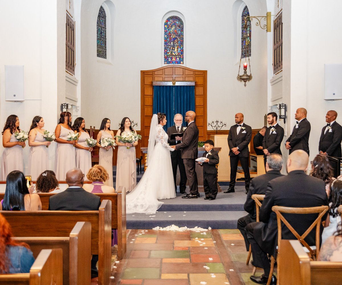 Bride and groom saying nuptials in historic chapel in San Francisco - Presidio Chapel at the Golden Gate Club - Wedgewood Weddings