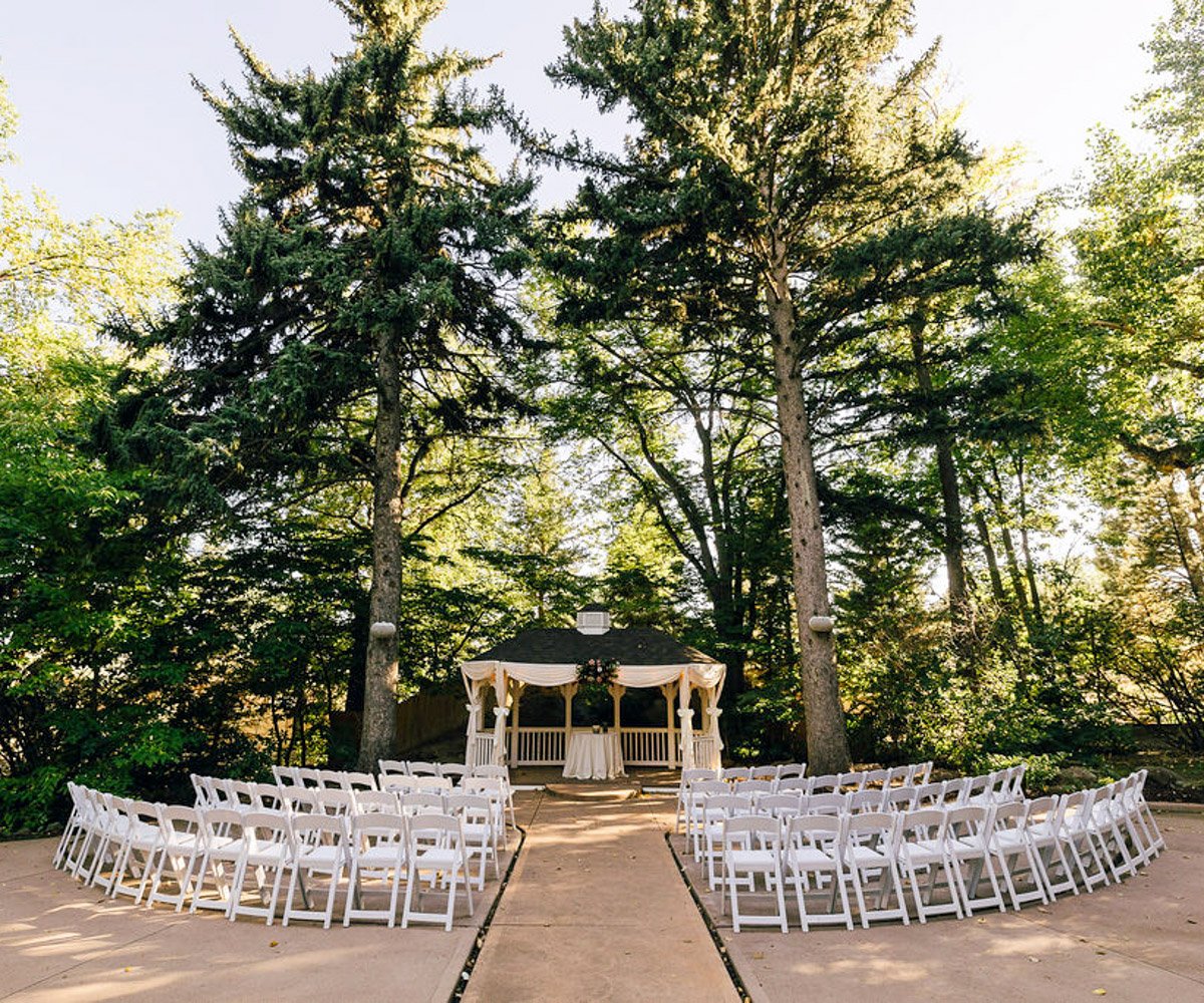 Alfresco ceremony gazebo surrounded by towering trees and greenery - Tapestry House by Wedgewood Weddings