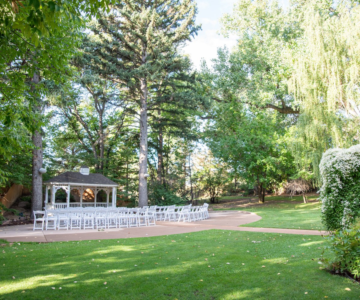 Open air wedding ceremony site with gazebo and lush greenery - Tapestry House by Wedgewood Weddings