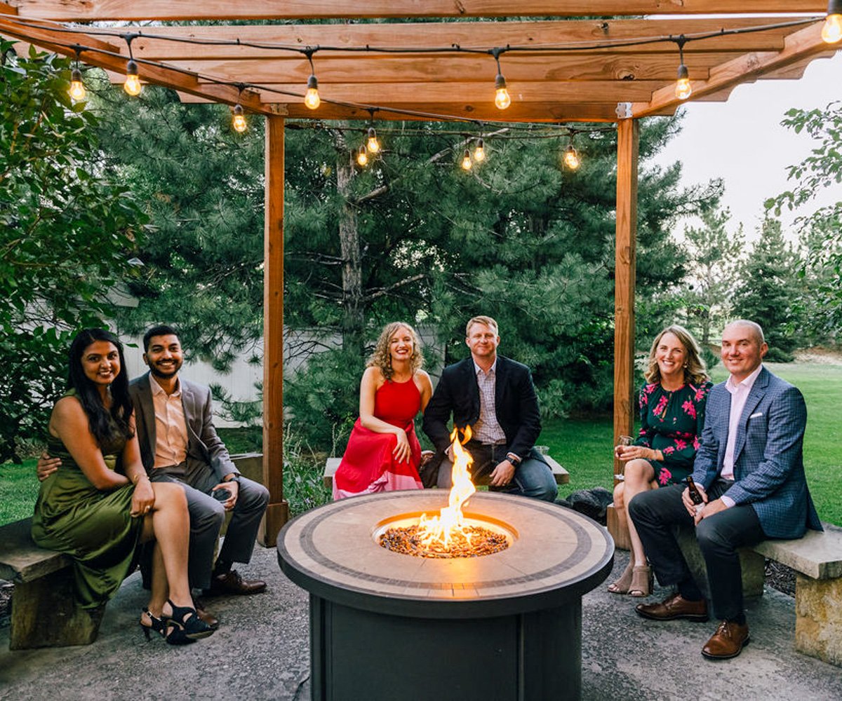 Outdoor patio with fire pit for guests to enjoy during the reception - Tapestry House by Wedgewood Weddings