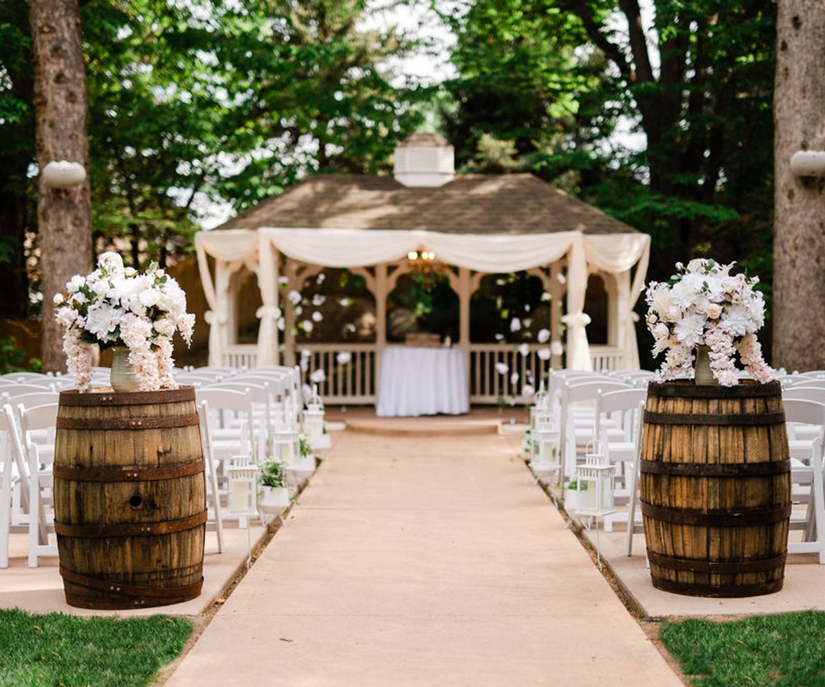 Rustic barrels in front of ceremony gazebo - Tapestry House by Wedgewood Weddings