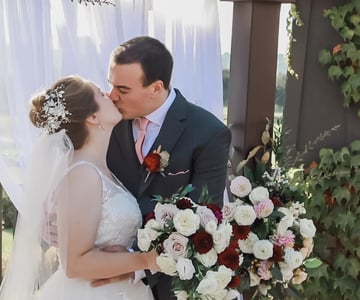 First Kiss at Stonetree Estate by Wedgewood Weddings